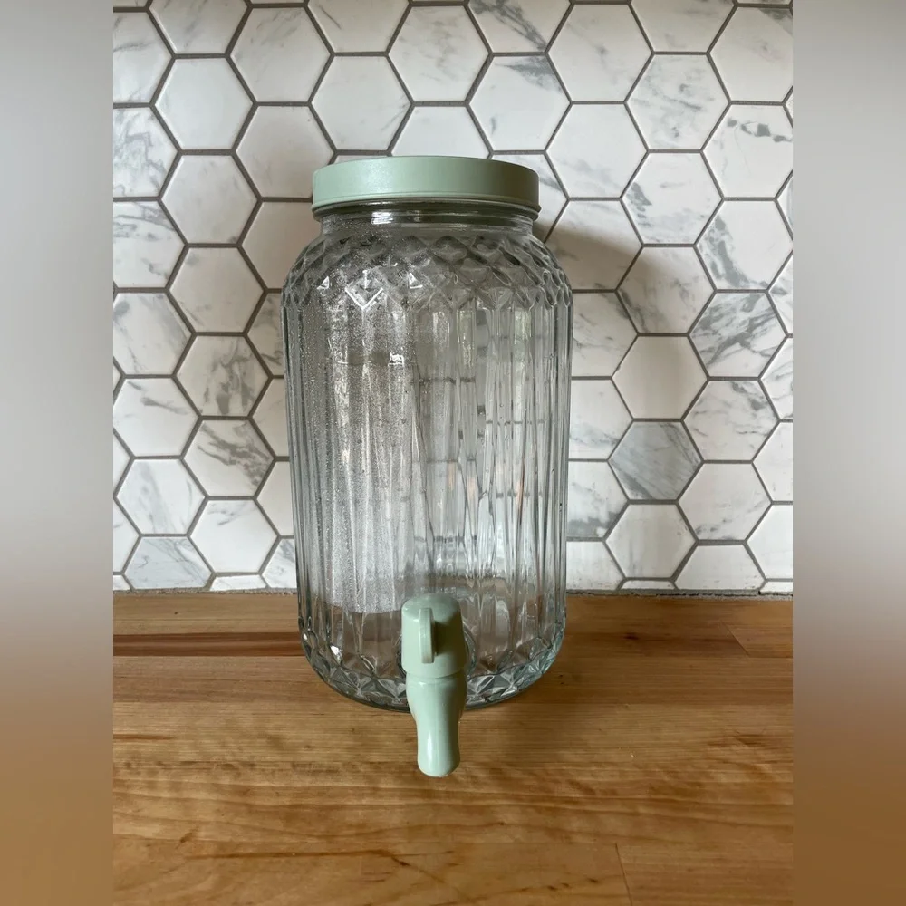 IKEA Clear Glass Beverage Dispenser with Green Lid and Spout